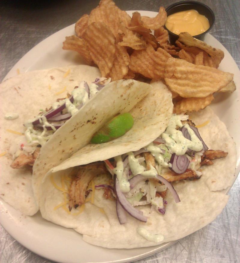 Juicy BBQ shredded chicken, blessed with our awesome Baja sauce!